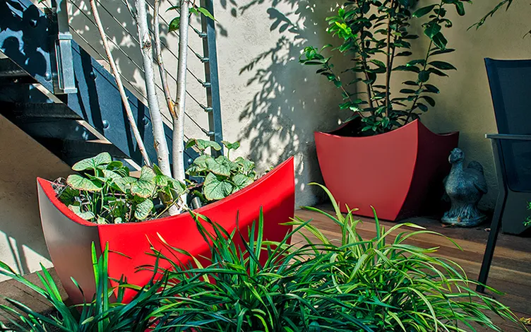 curved red planters